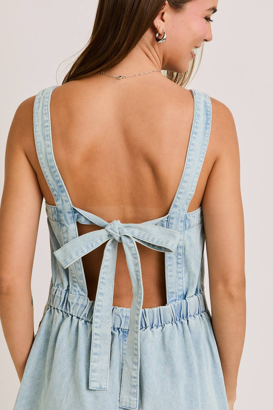 LE LIS - BACK TIE DENIM ROMPER