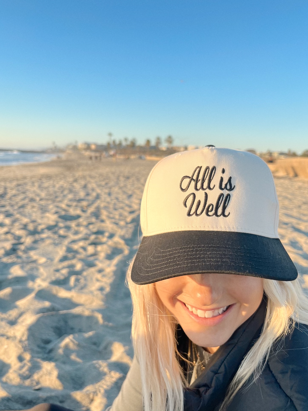 Ruby Moon - All Is Well- Embroidered Trucker Hat- Black/Natural Hat