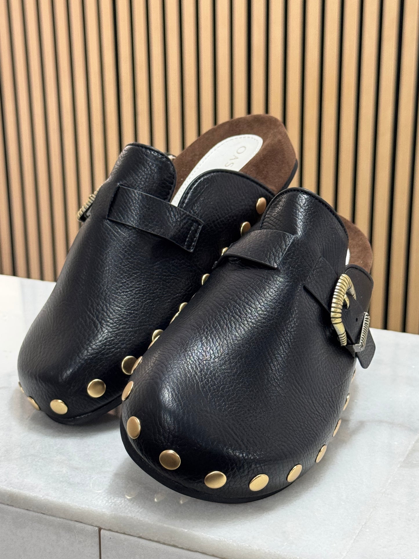 Studded buckle clog