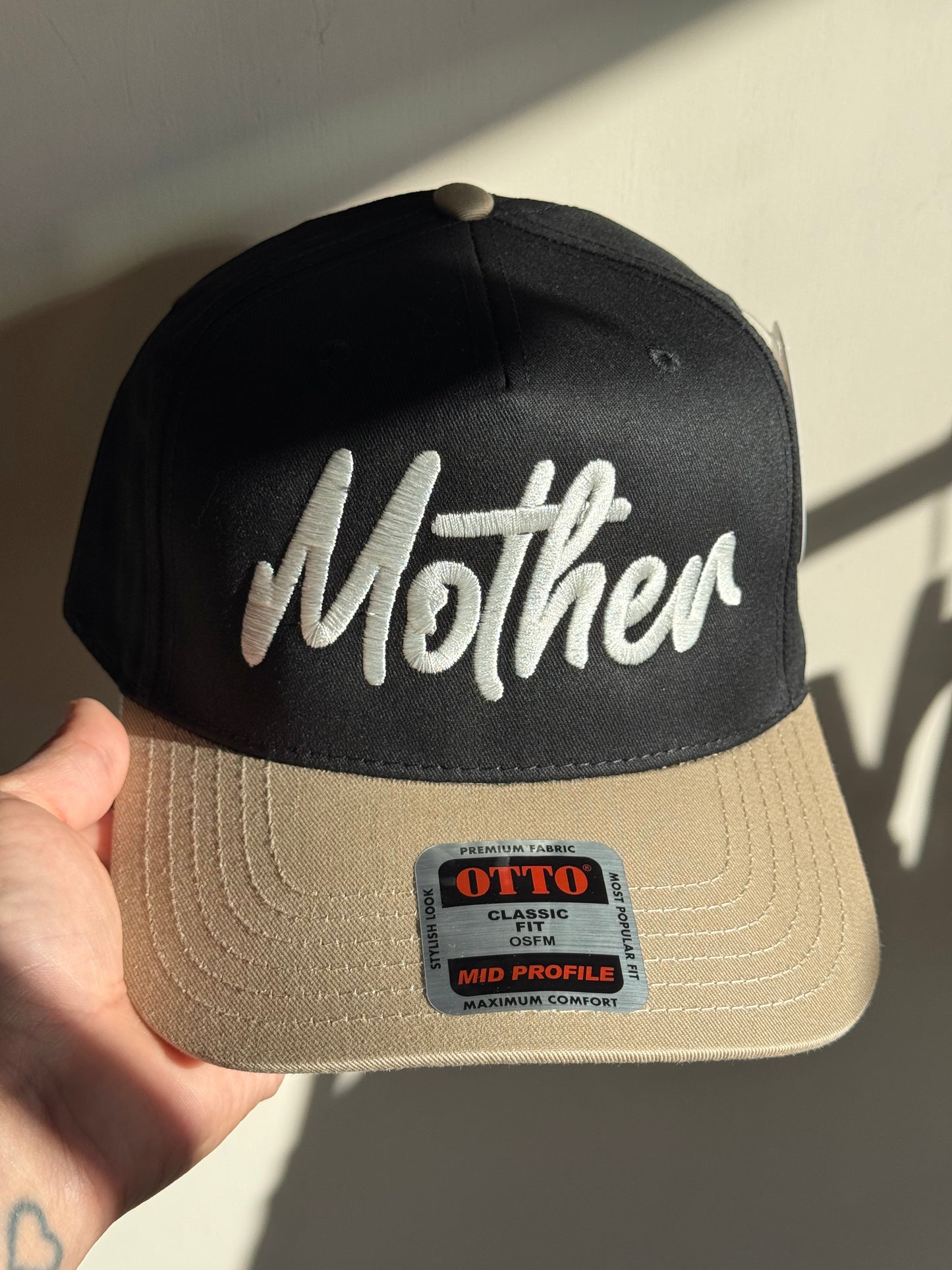 The Babe Co. - Mother Black & Tan Women's Embroidered Trucker Hat