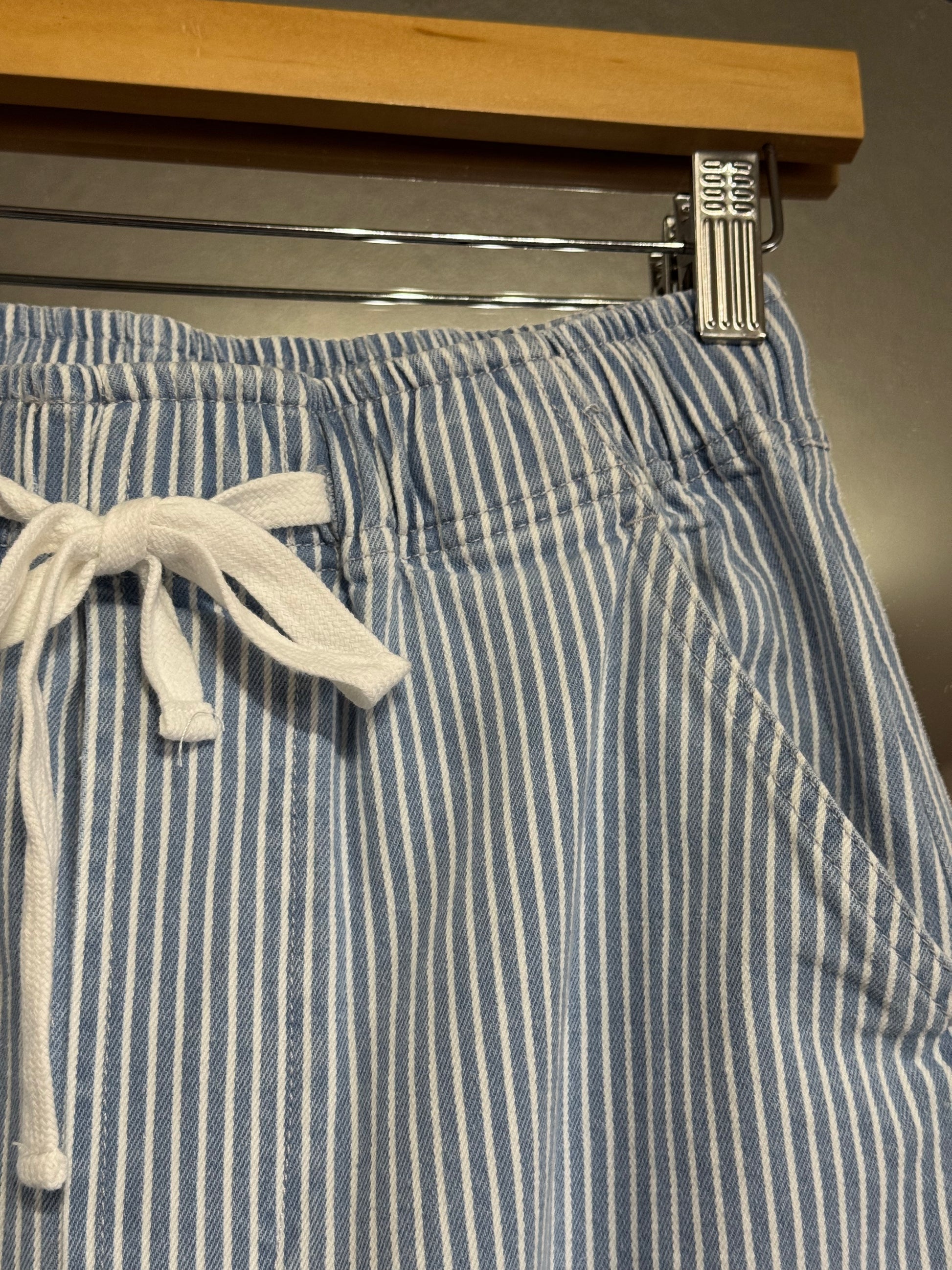 Light wash, high rise, pinstripe blue and off white denim like pull on barrel leg pant, these drawstring waistband barrel pants are the spring inspo of the season