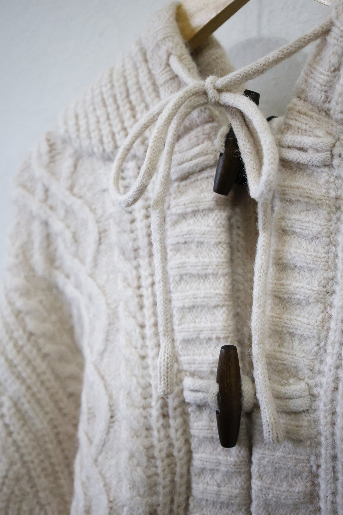 Miou Muse- Long Sleeve cable Knit Cardigan With Toggle front and Hood