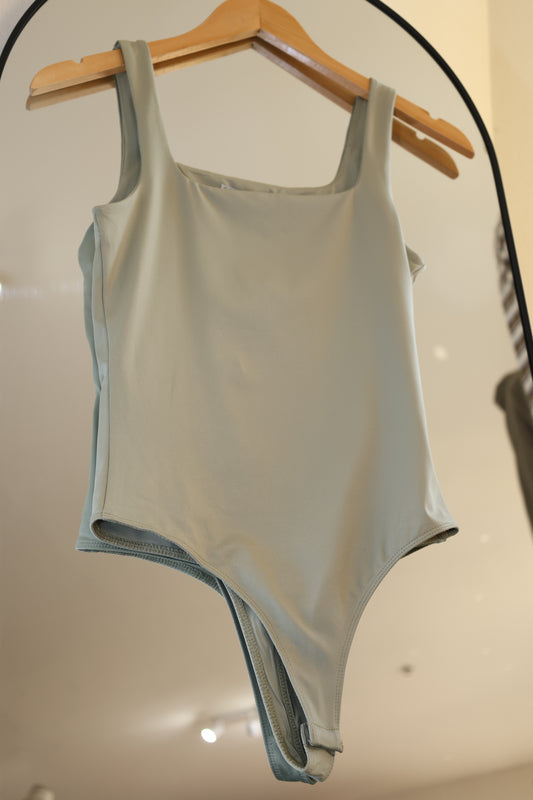 Dress Forum - Soft V-Neck Thong Bodysuit