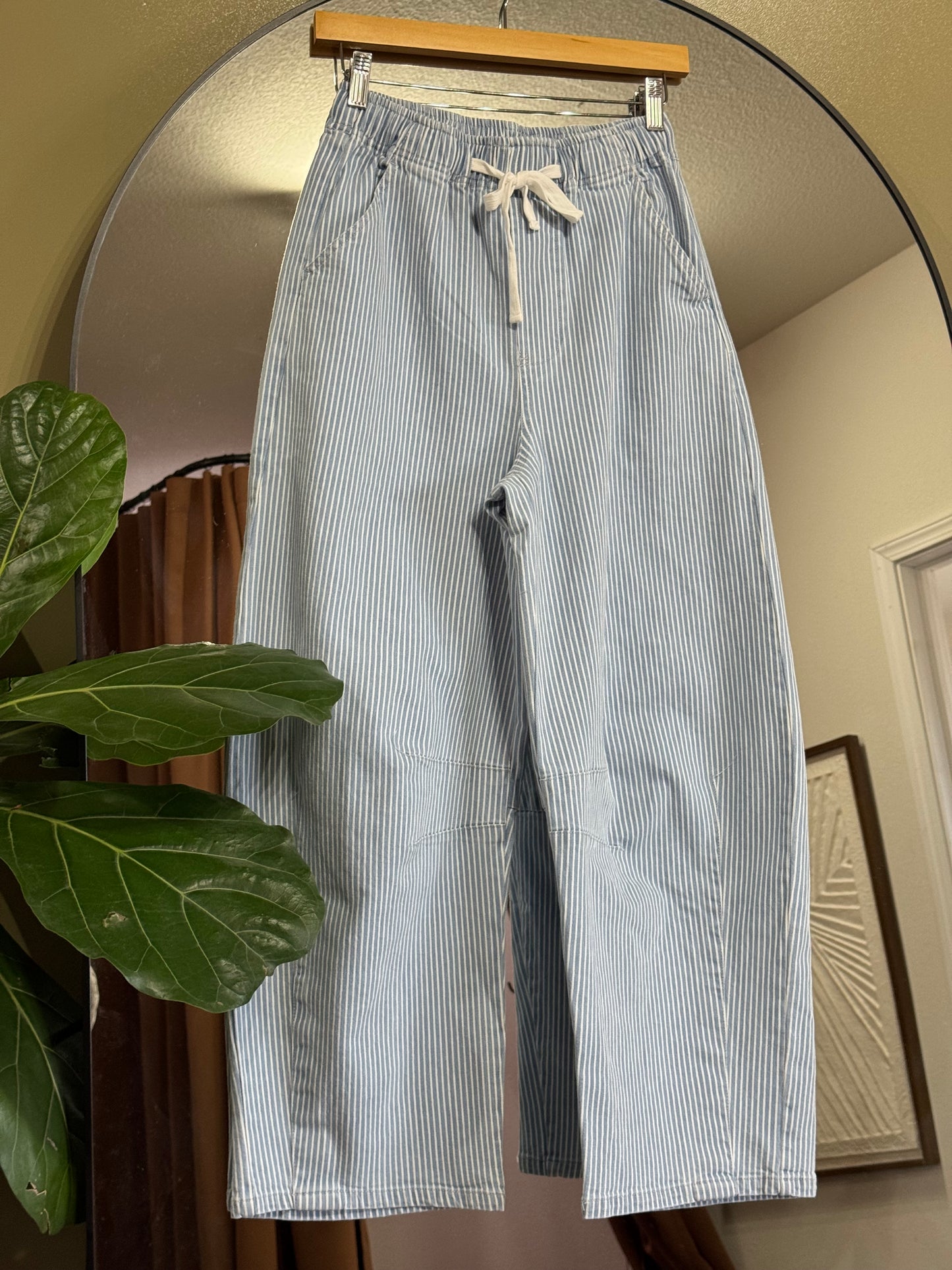 Light wash, high rise, pinstripe blue and off white denim like pull on barrel leg pant, these drawstring waistband barrel pants are the spring inspo of the season 