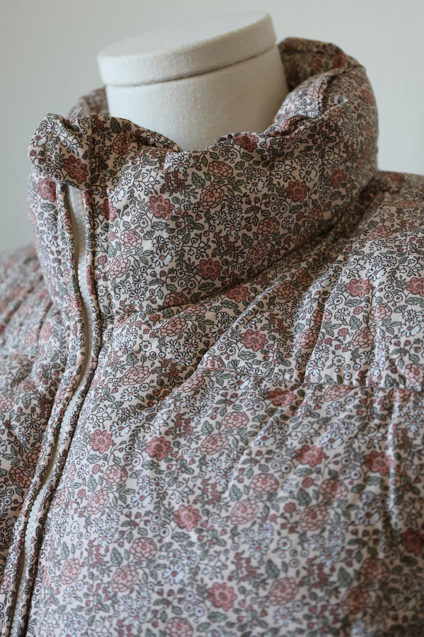 Buttermelon floral puffer vest