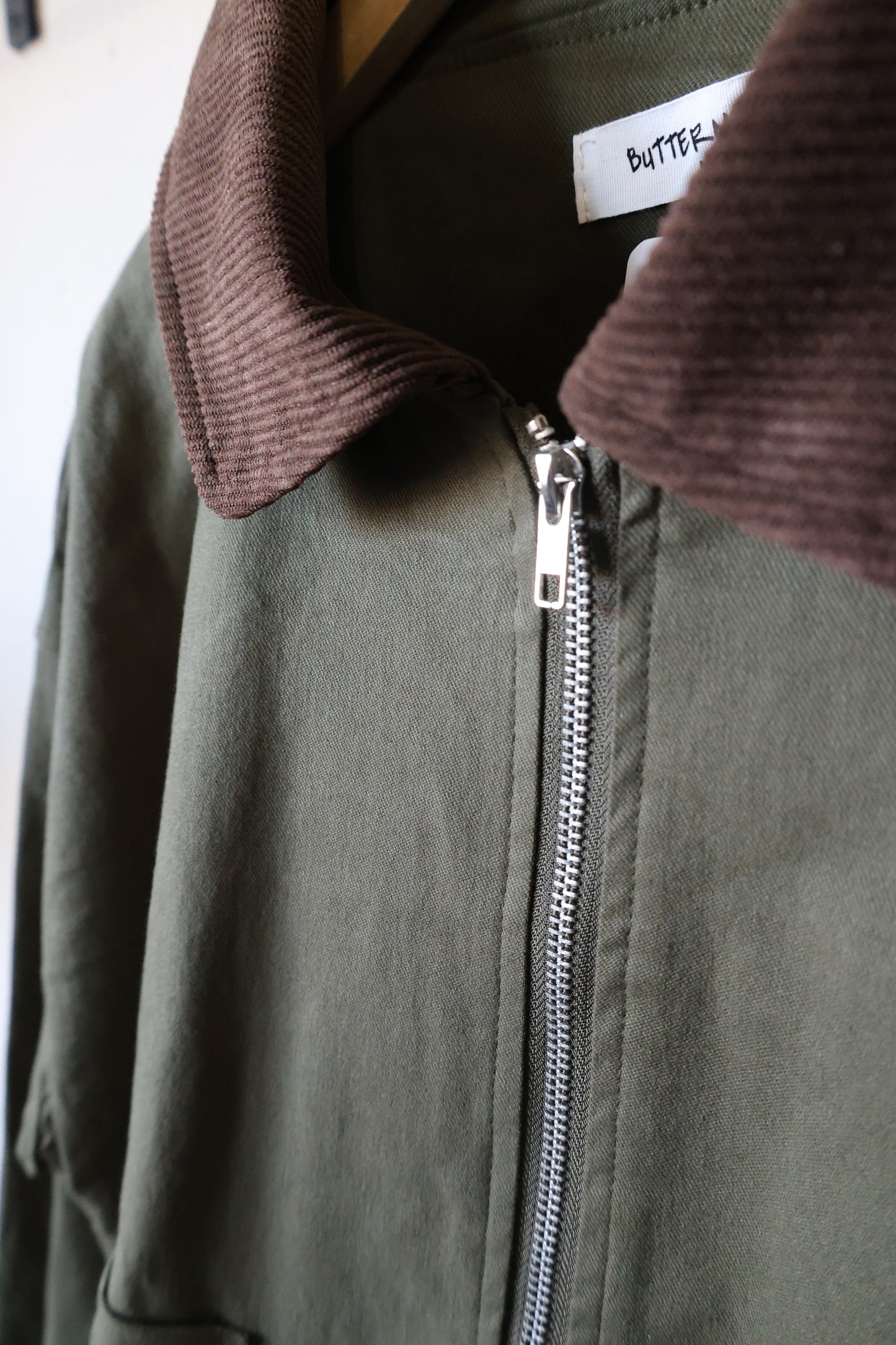 BUTTERMELON - Collared Zip-Up Drawstring Jacket