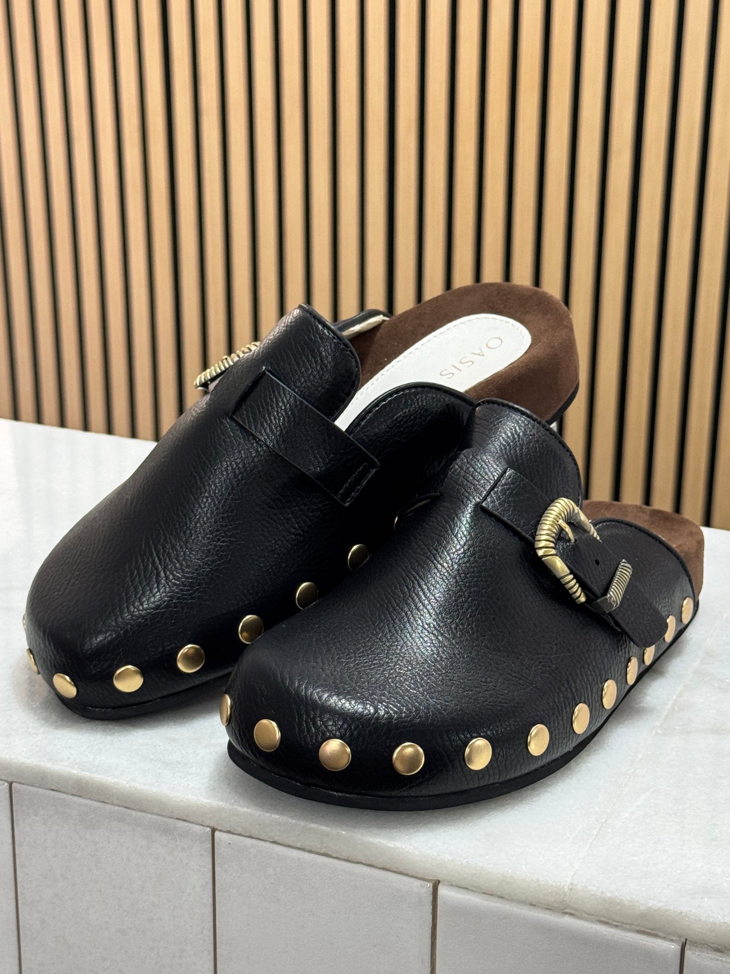 Studded buckle clog