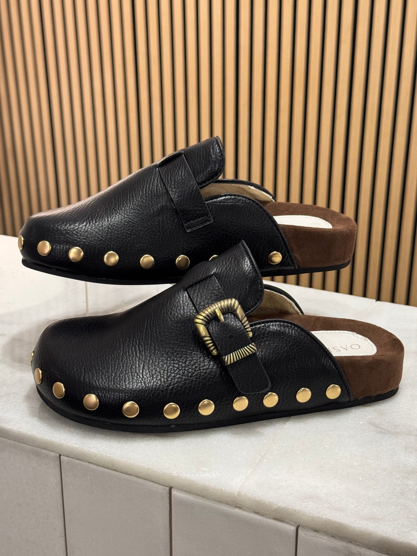 Studded buckle clog