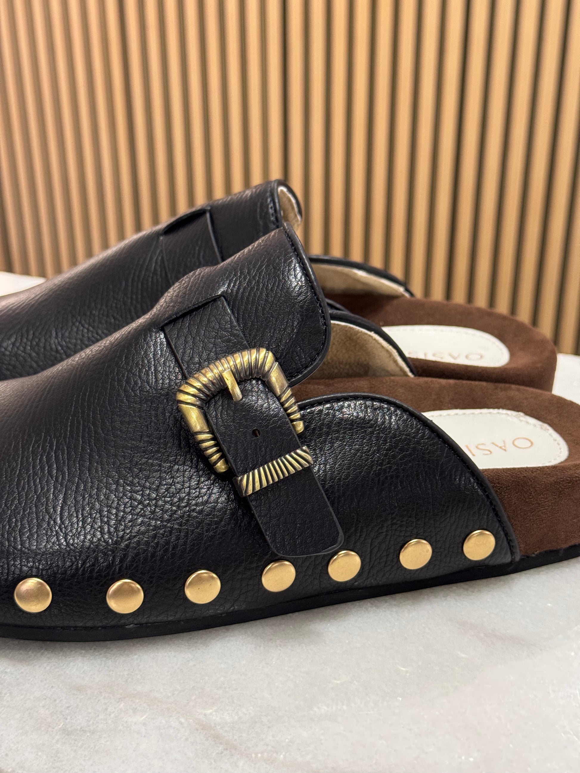 Studded buckle clog