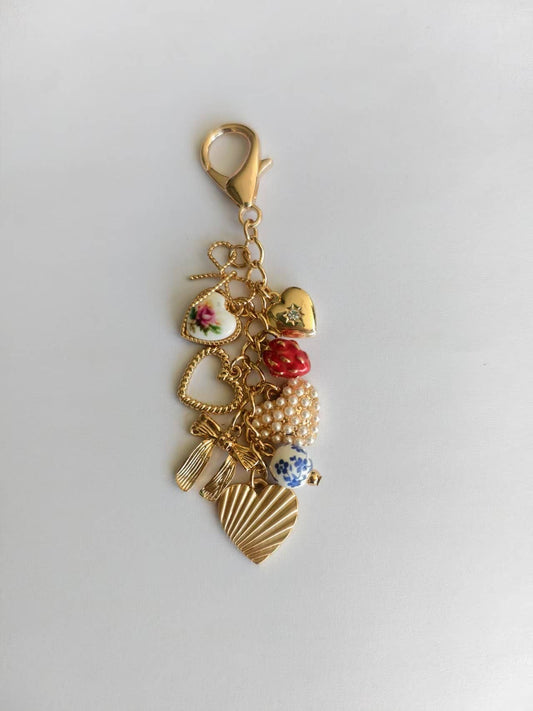 JOSSLYN by wall to wall - PORCELAIN BOWS HEARTS PEARL STRAWBERRY BAG CHARM